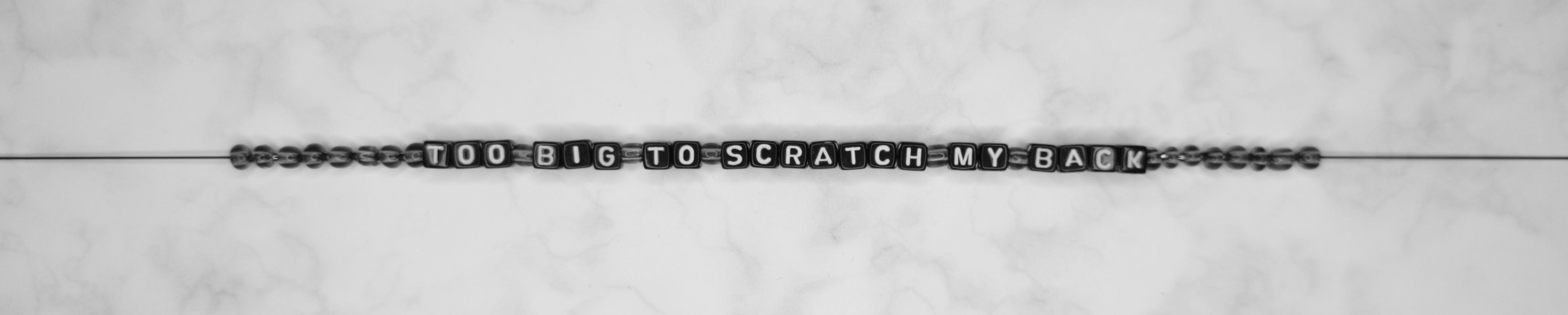 too big to scratch my back